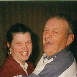A smiling husband and wife